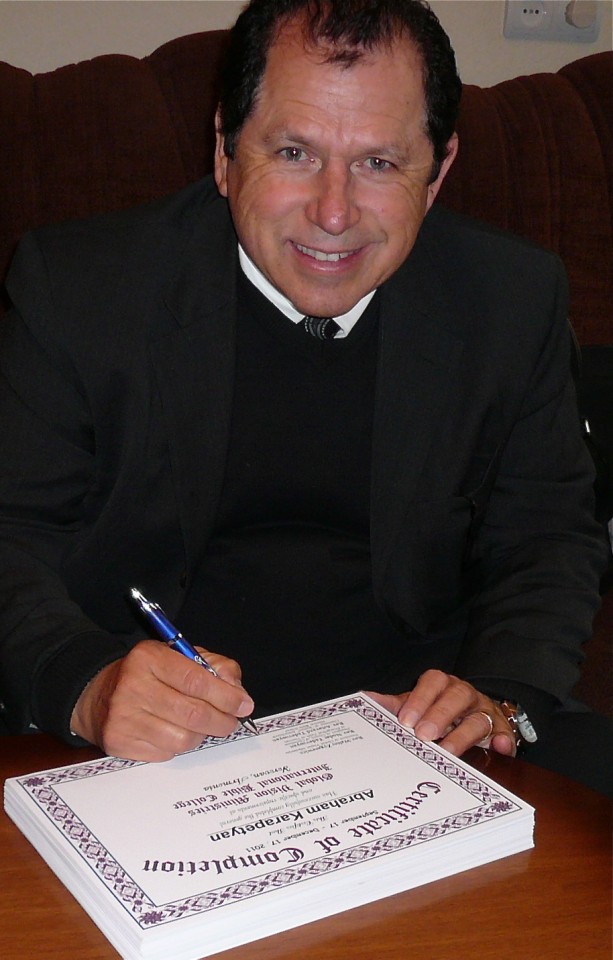 Walter Signing Diplomas in Armenia